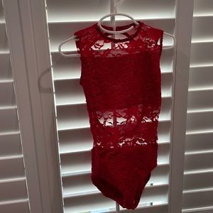 red sokali leo tard with gold shimmer underneath